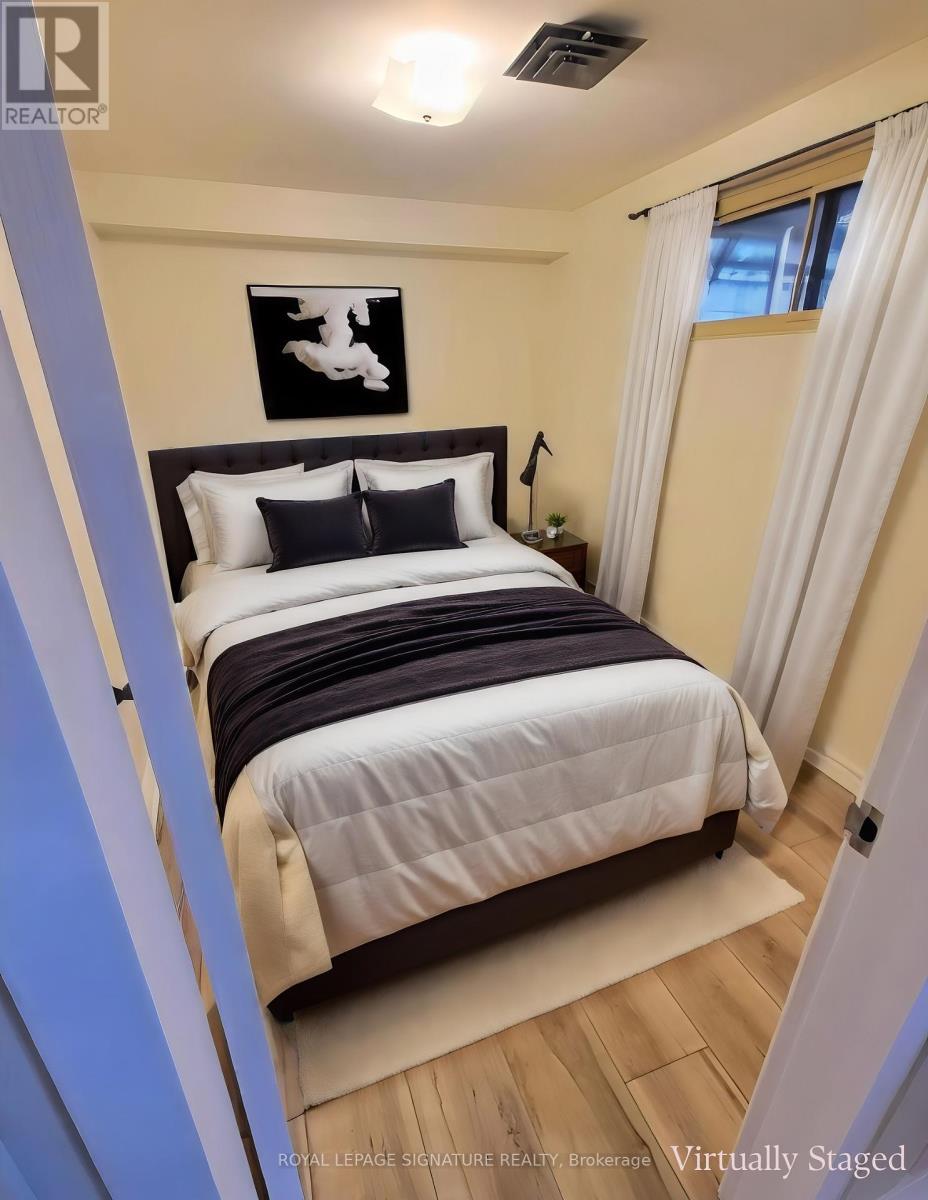 Lower - 64 Watney Crescent, Toronto, Ontario  M3L 2C9 - Photo 12 - W12196236