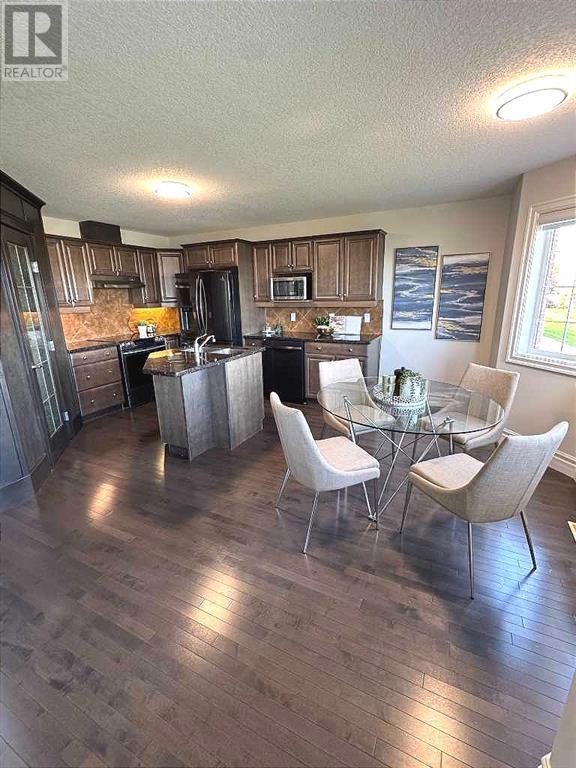 43 Prominence Path Sw, Calgary, Alberta  T3M 2W7 - Photo 5 - A2207981