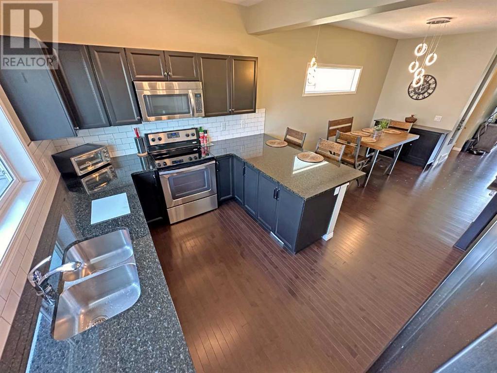 154 Marquis Common Se, Calgary, Alberta  T3M 1N7 - Photo 11 - A2210841
