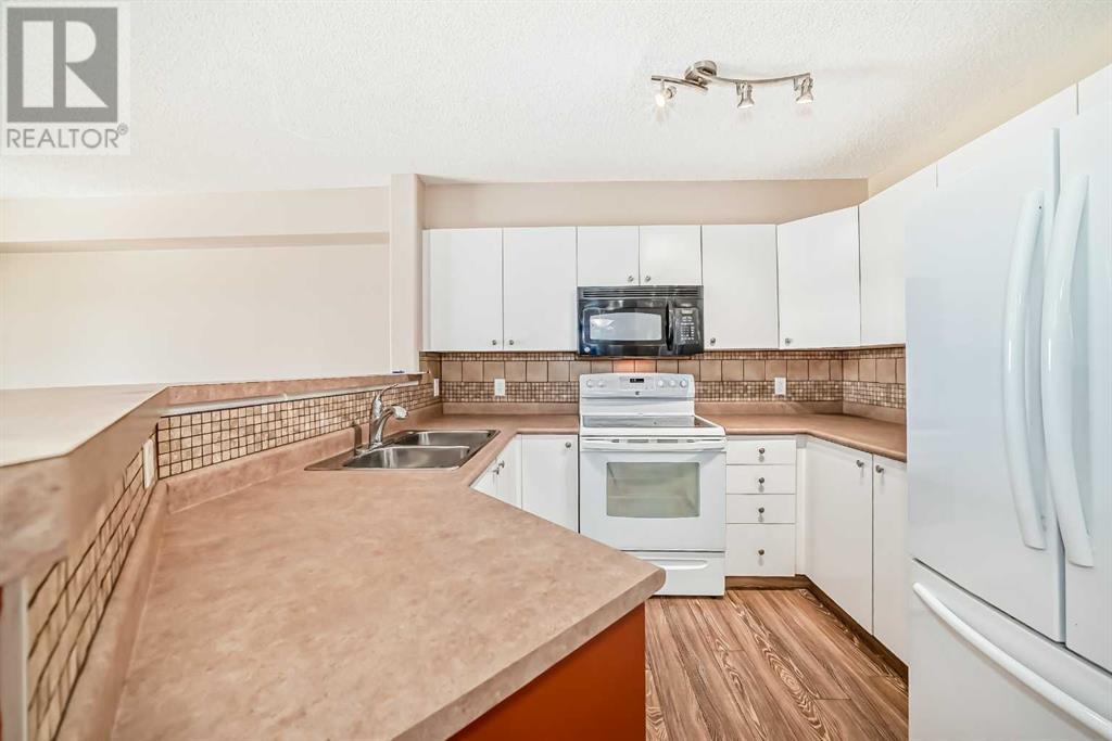 Property at 6103, 304 Mackenzie Way SW image 4