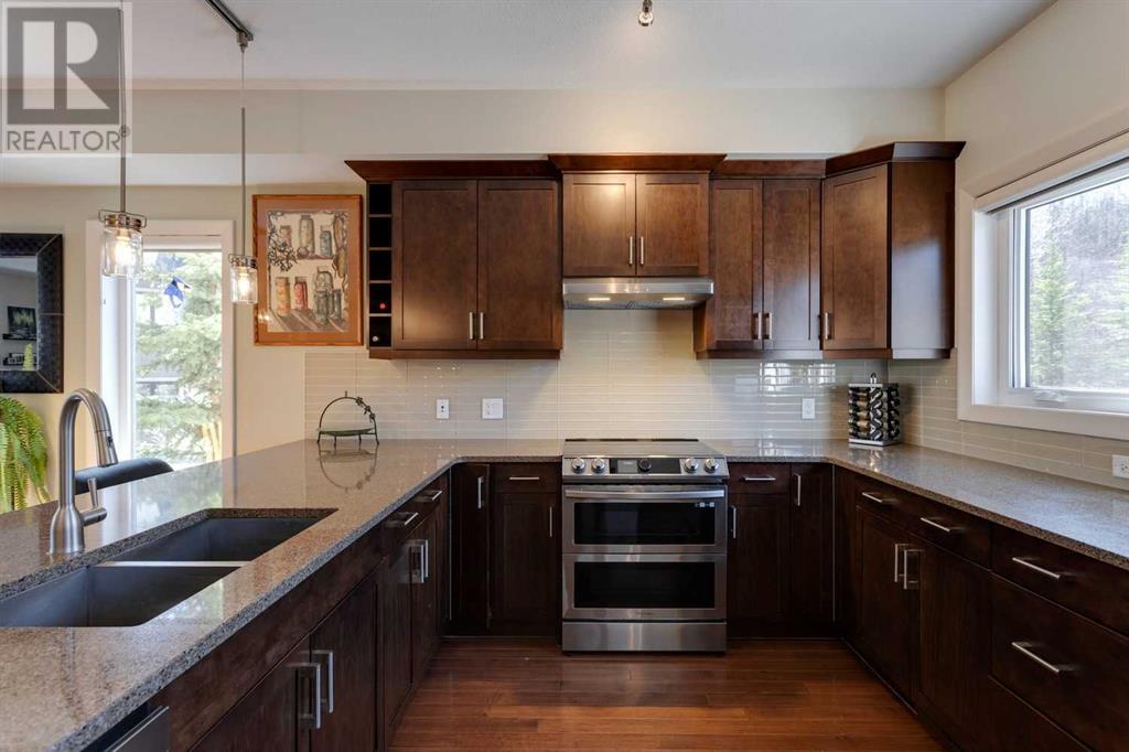 303 Valley Ridge Manor Nw, Calgary, Alberta  T3B 6C4 - Photo 7 - A2215022