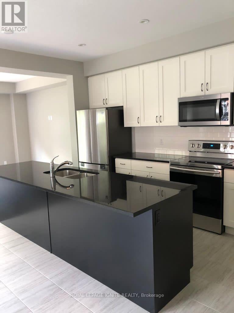 898 Robert Ferrie Drive, Kitchener, Ontario  N2R 0P2 - Photo 3 - X12196755
