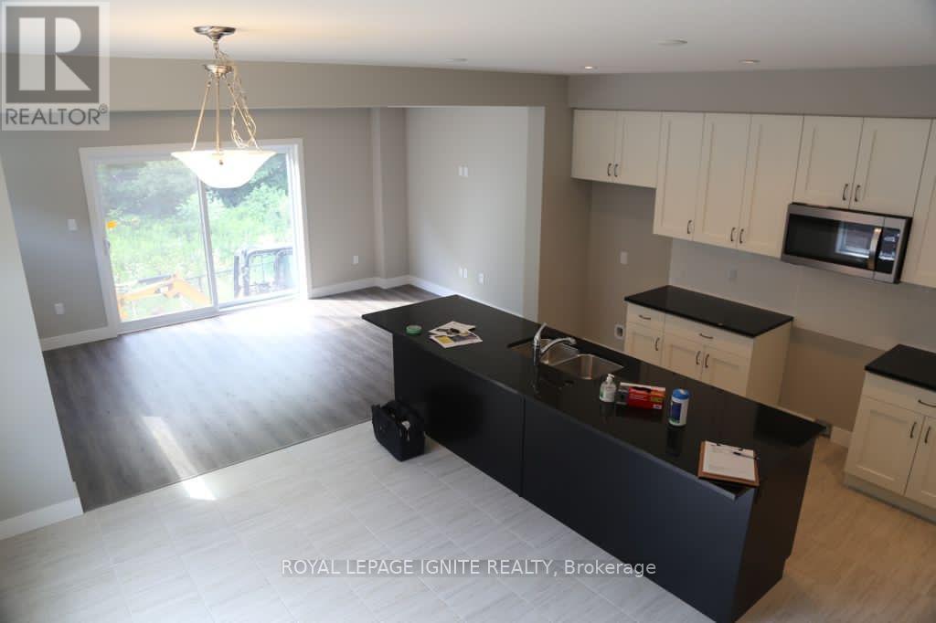 898 Robert Ferrie Drive, Kitchener, Ontario  N2R 0P2 - Photo 4 - X12196755