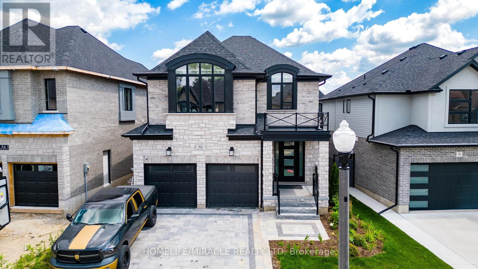 80 Doon Creek Street, Kitchener, Ontario  N2R 0M3 - Photo 3 - X12196805