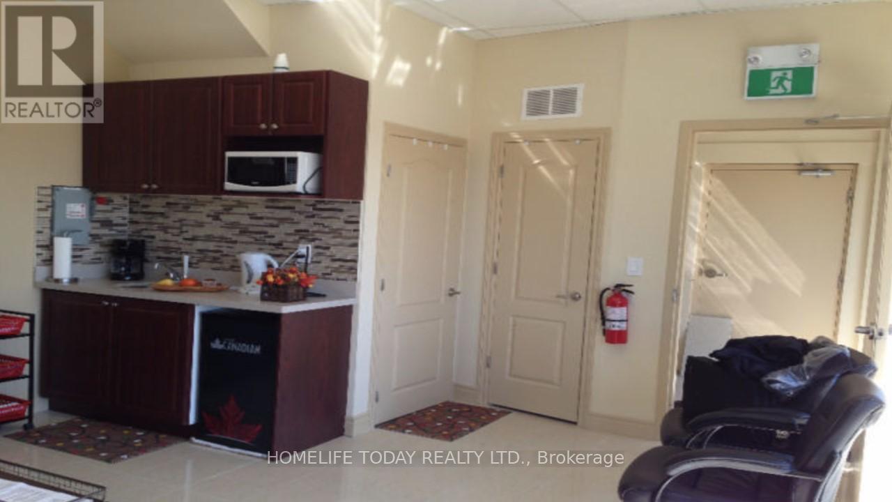 106 - 30 New Delhi Drive, Markham, Ontario  L3S 0B5 - Photo 4 - N12196906