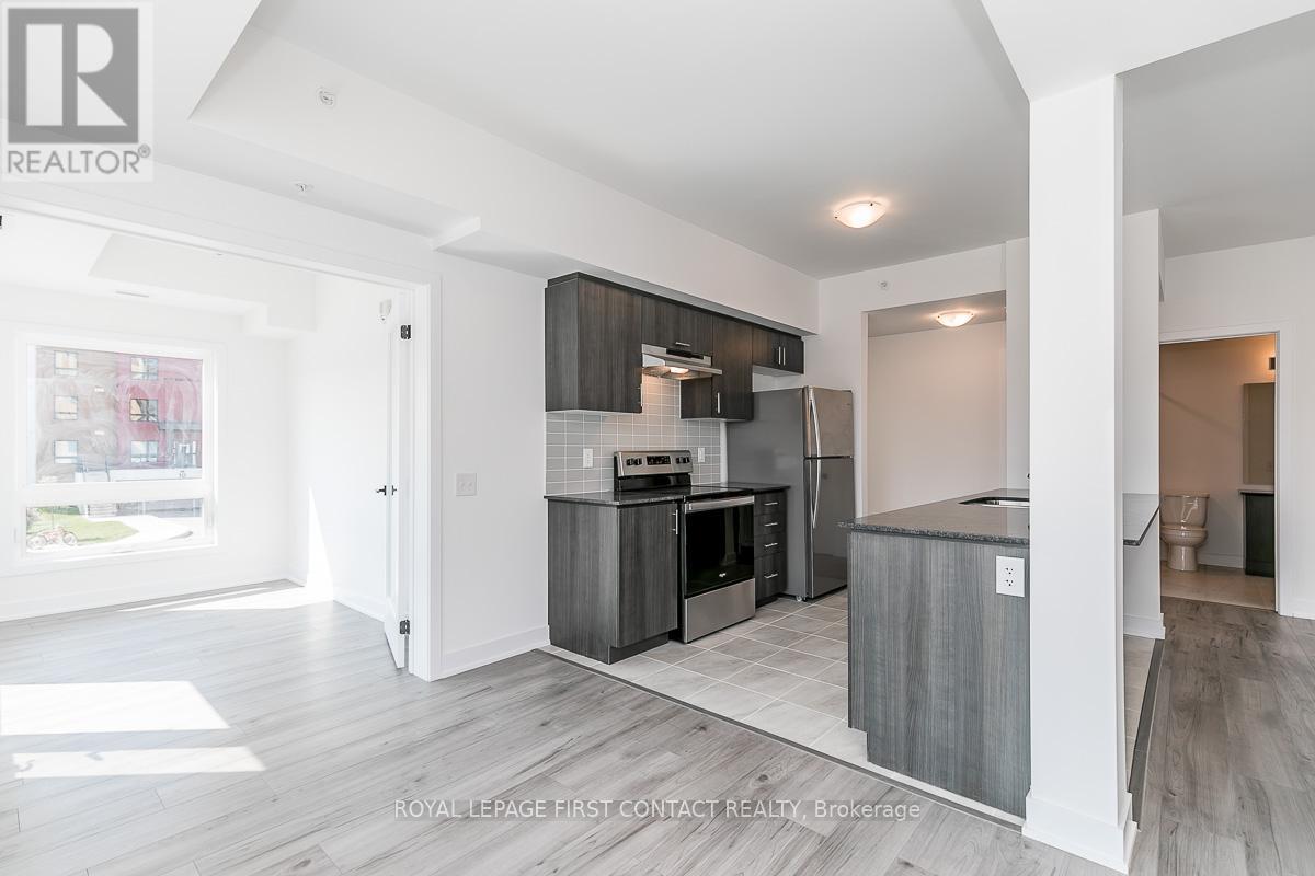 101 - 8 Culinary Lane, Barrie, Ontario  L9J 0J9 - Photo 4 - S12196829