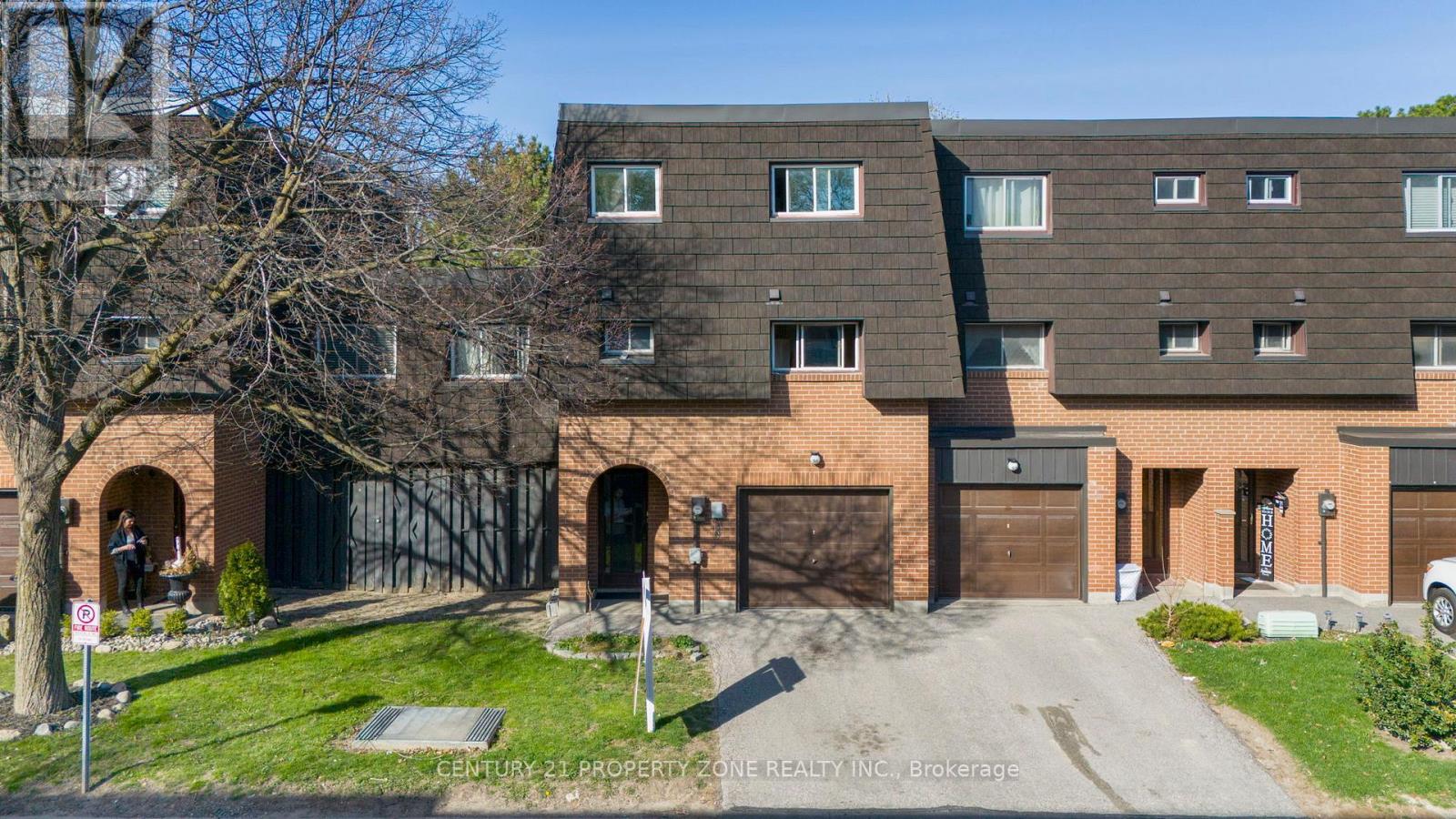 55 Darras Court, Brampton, Ontario  L6T 1W7 - Photo 1 - W12196879