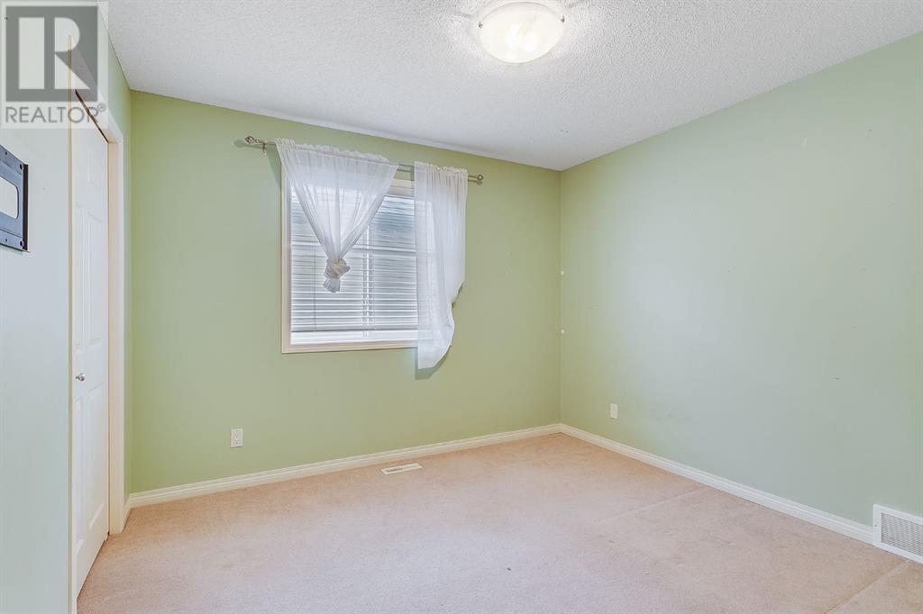 596 Cougar Ridge Drive Sw, Calgary, Alberta  T3H 5A4 - Photo 27 - A2216232