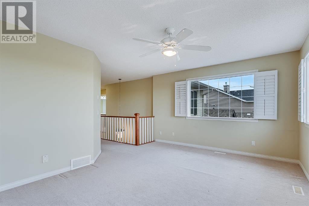 596 Cougar Ridge Drive Sw, Calgary, Alberta  T3H 5A4 - Photo 24 - A2216232