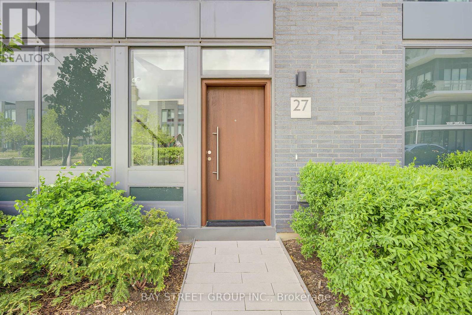 27 Sonic Way, Toronto, Ontario  M3C 0P3 - Photo 2 - C12197374