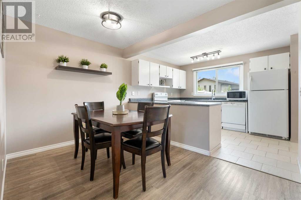 118 Woodmont Terrace Sw, Calgary, Alberta  T2W 4Z4 - Photo 7 - A2225088