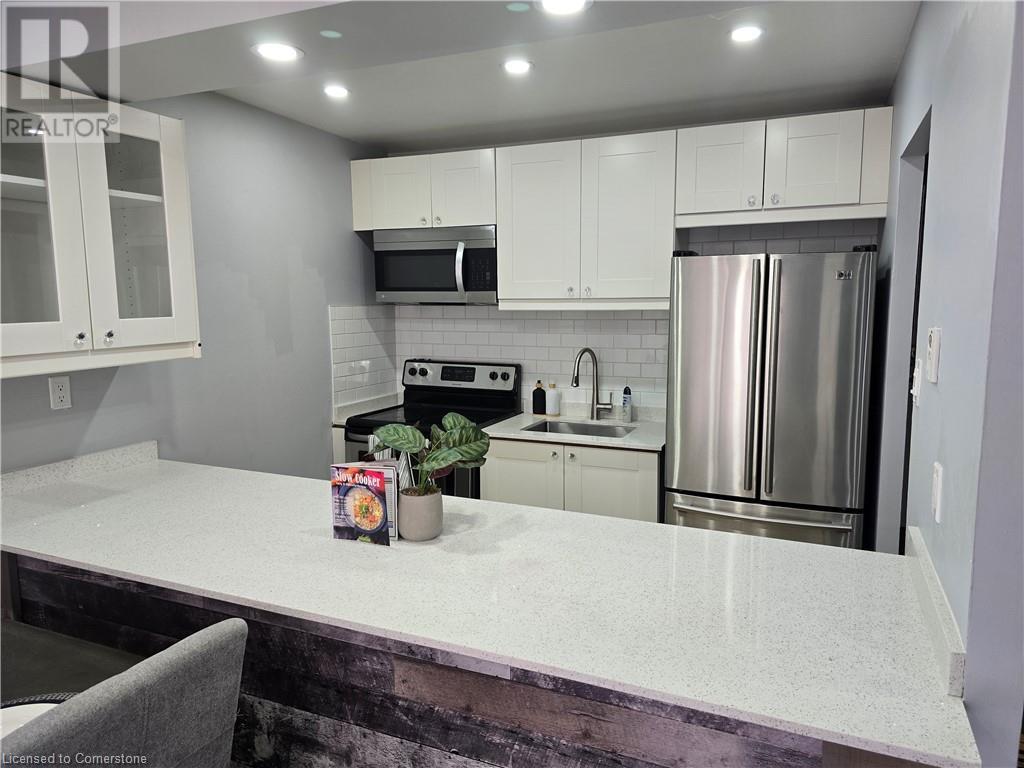 1016 Falgarwood Drive Unit# 40, Oakville, Ontario  L6H 2P5 - Photo 7 - 40737046
