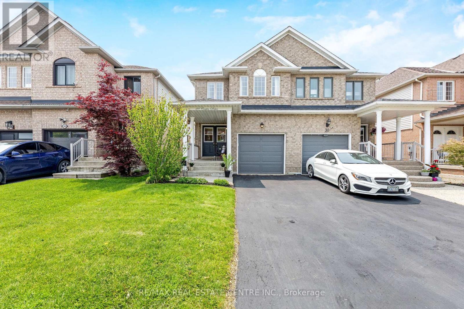 28 Coates Drive, Milton, Ontario  L9T 5R4 - Photo 1 - W12197419