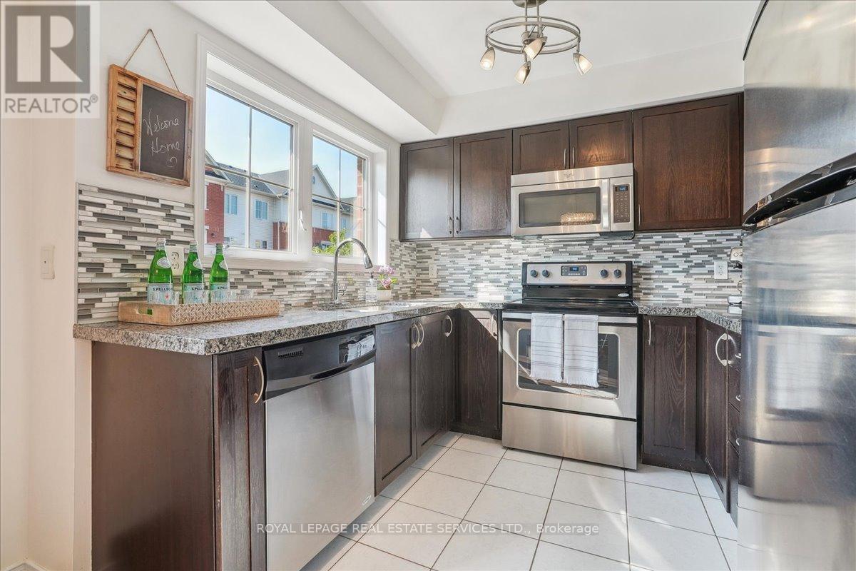 9 - 2464 Post Road, Oakville (Ro River Oaks), Ontario  L6H 0J2 - Photo 6 - W12197446