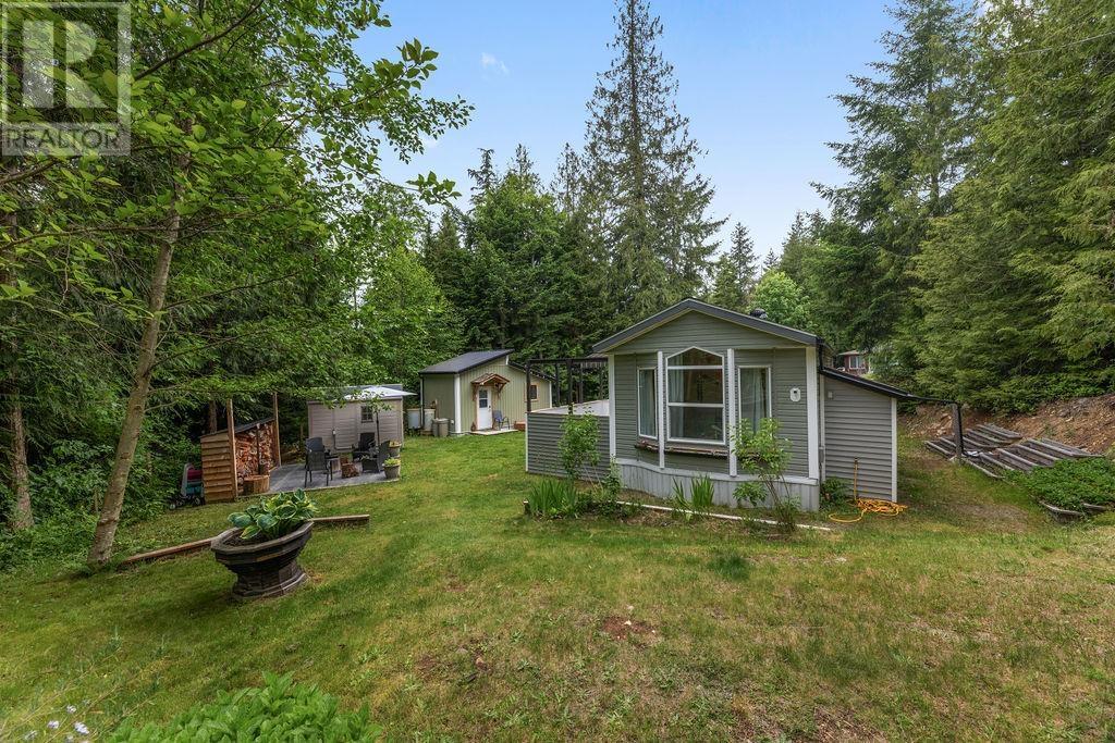 5954 LEANING TREE ROAD, Halfmoon Bay, British Columbia