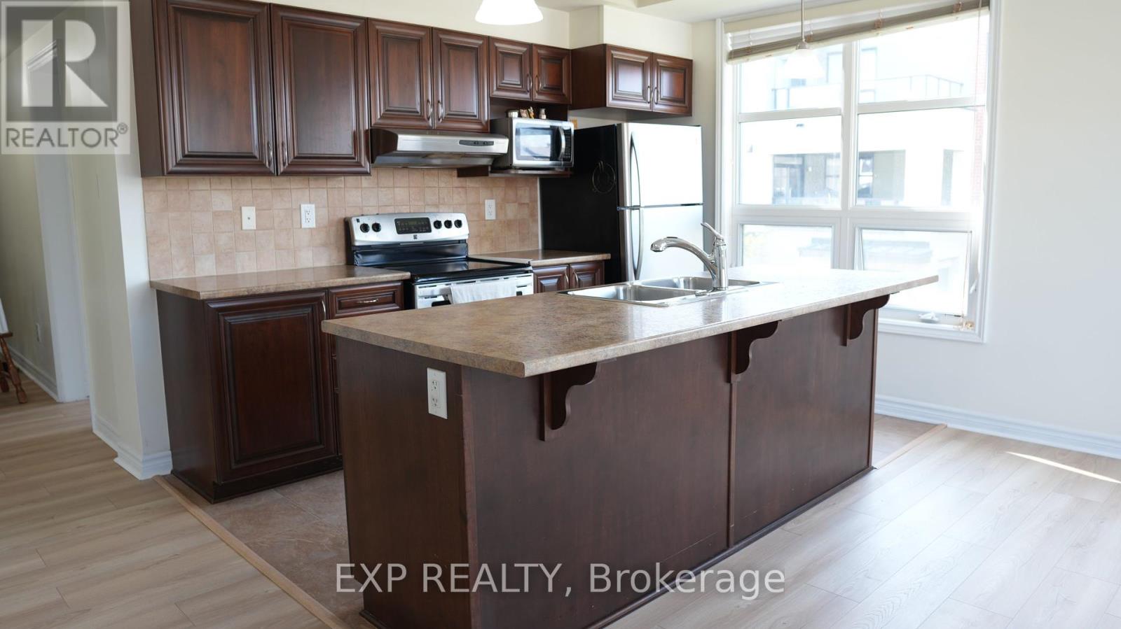205 - 200 Glenroy Gilbert Drive, Ottawa, Ontario  K2J 5G3 - Photo 10 - X12199152