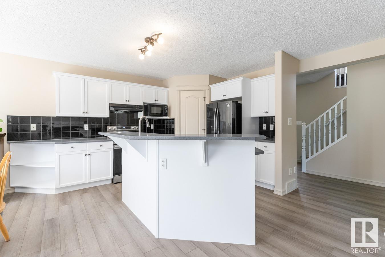 Property at 1116 84 ST SW image 4