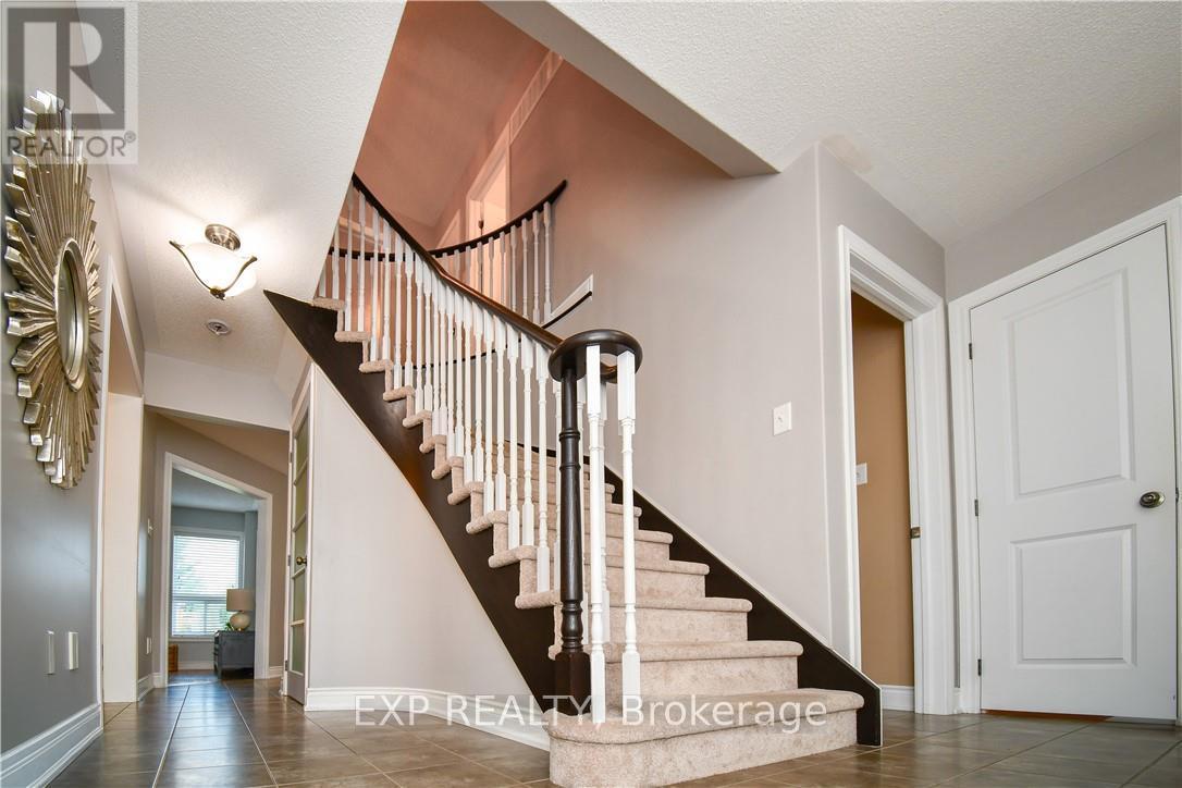 452 Greenwood Drive, Essa, Ontario  L0M 1B6 - Photo 10 - N12199274