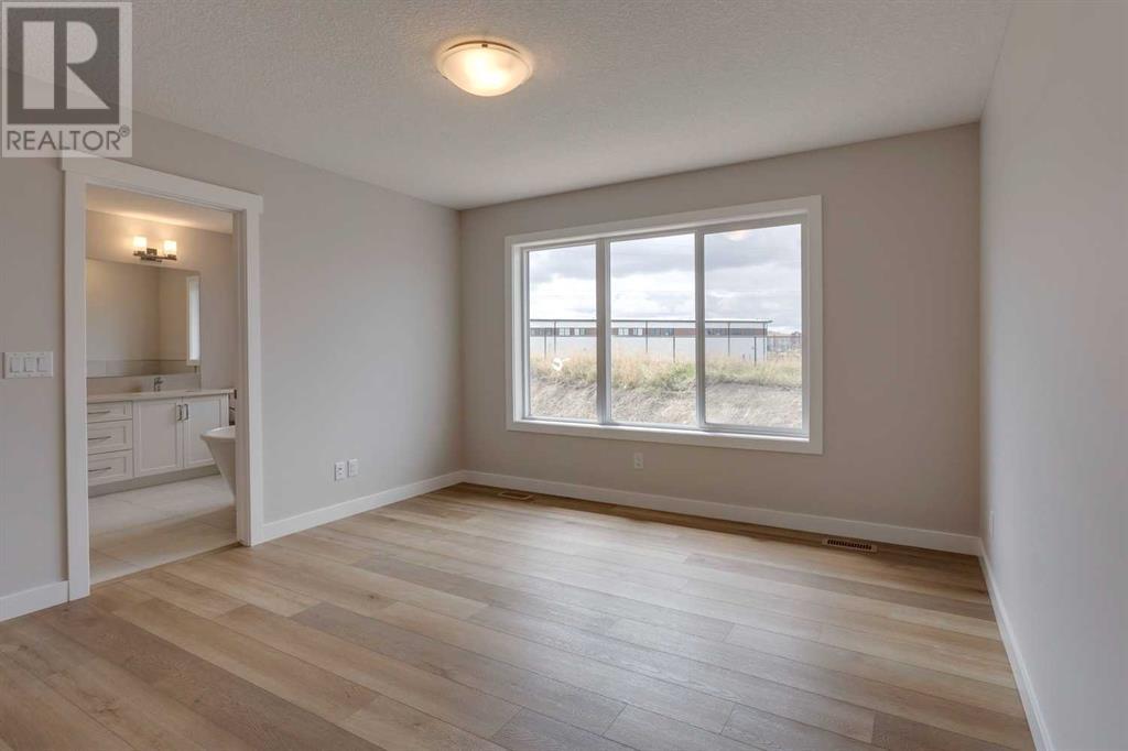 32 Willow Park Point, Cochrane, Alberta  T4C 2V3 - Photo 35 - A2225533