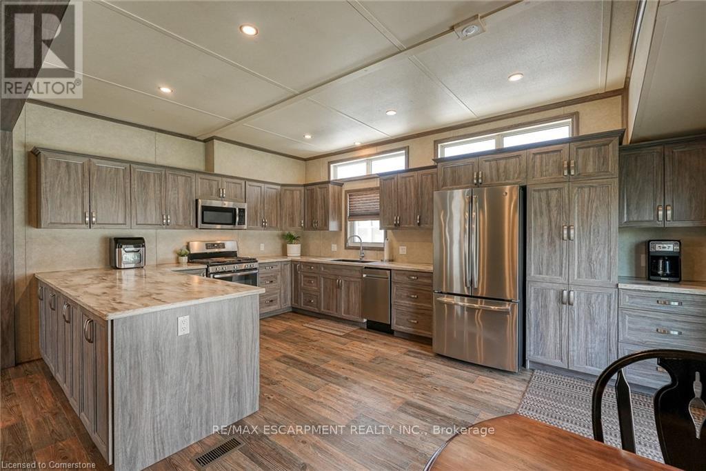 10 Cedar - 4449 Milburough Line, Burlington, Ontario  L7P 0P5 - Photo 1 - W12200028