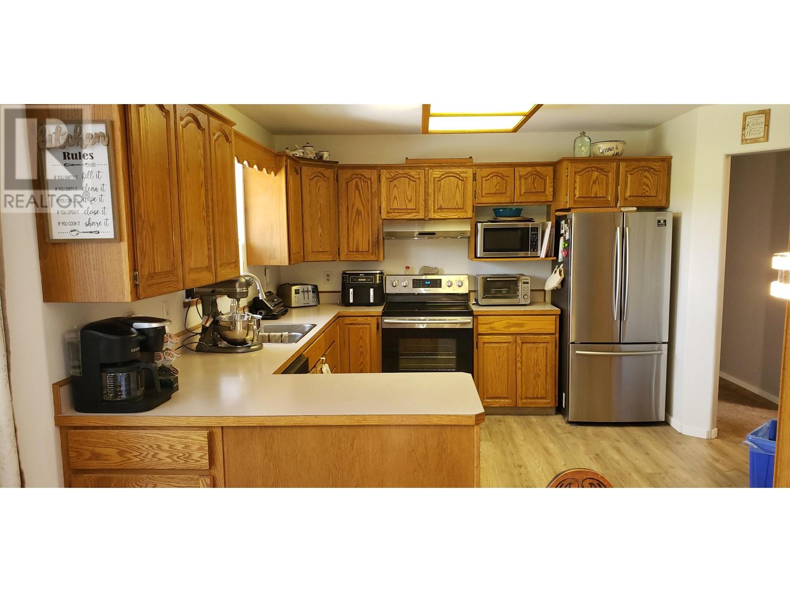 7036 93 Mile Frontage Road, 100 Mile House, British Columbia  V0K 2E2 - Photo 7 - R3012050