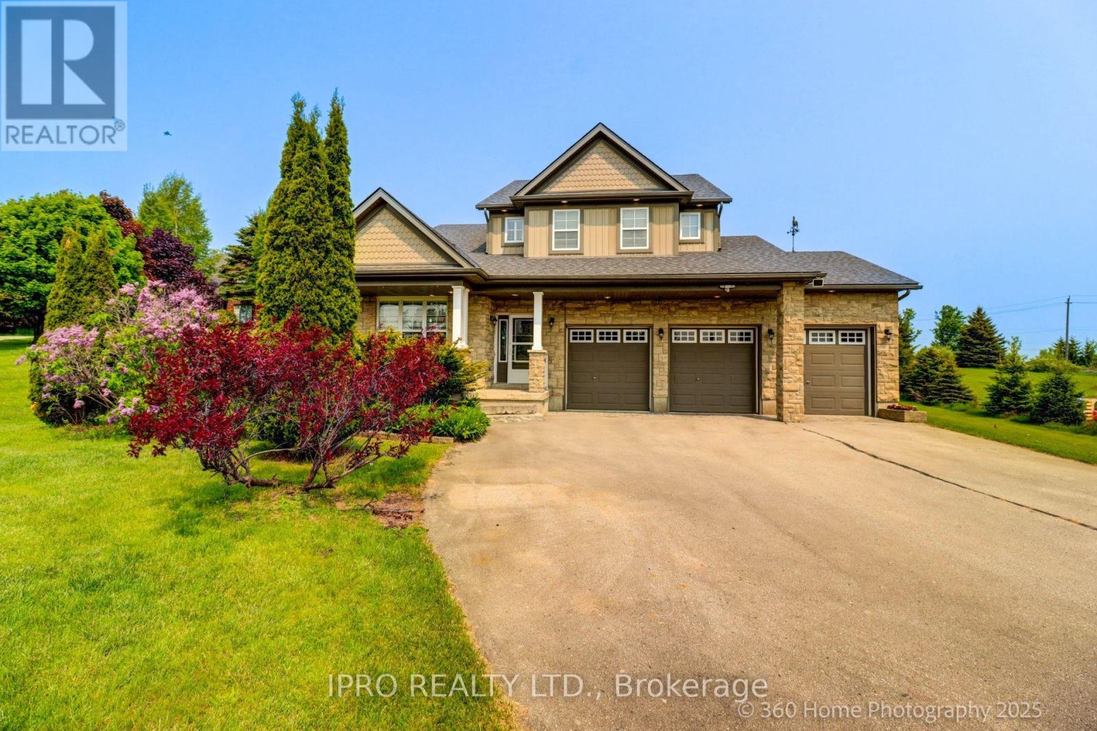 37 Woodland Drive, East Garafraxa, Ontario  L9W 6B7 - Photo 1 - X12200831