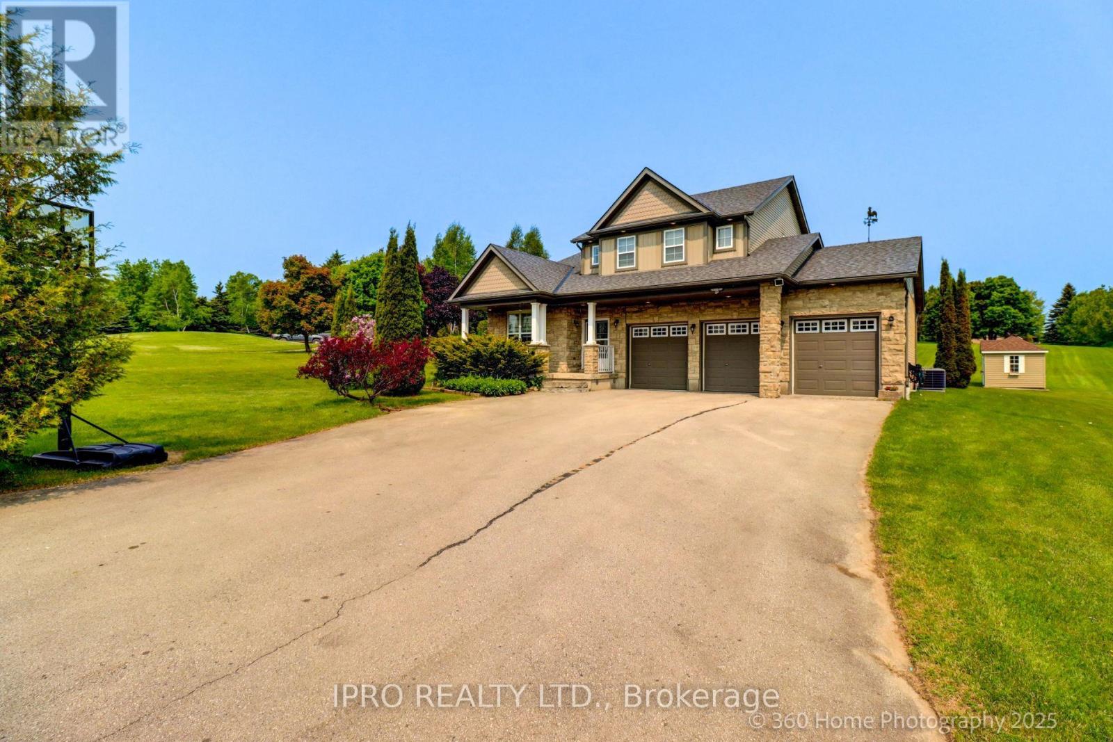 37 Woodland Drive, East Garafraxa, Ontario  L9W 6B7 - Photo 2 - X12200831