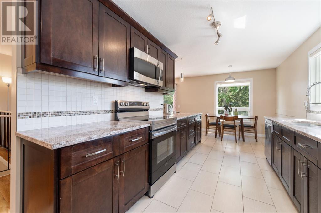 8003 Ranchview Drive Nw, Calgary, Alberta  T3G 1S7 - Photo 11 - A2226134