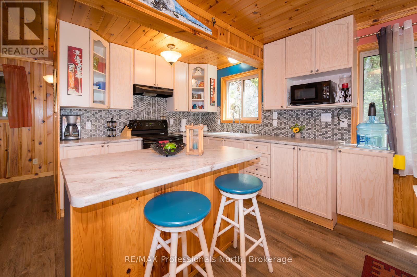 255 Cedar Lane, Kearney (Proudfoot), Ontario  P0A 1M0 - Photo 8 - X12201030