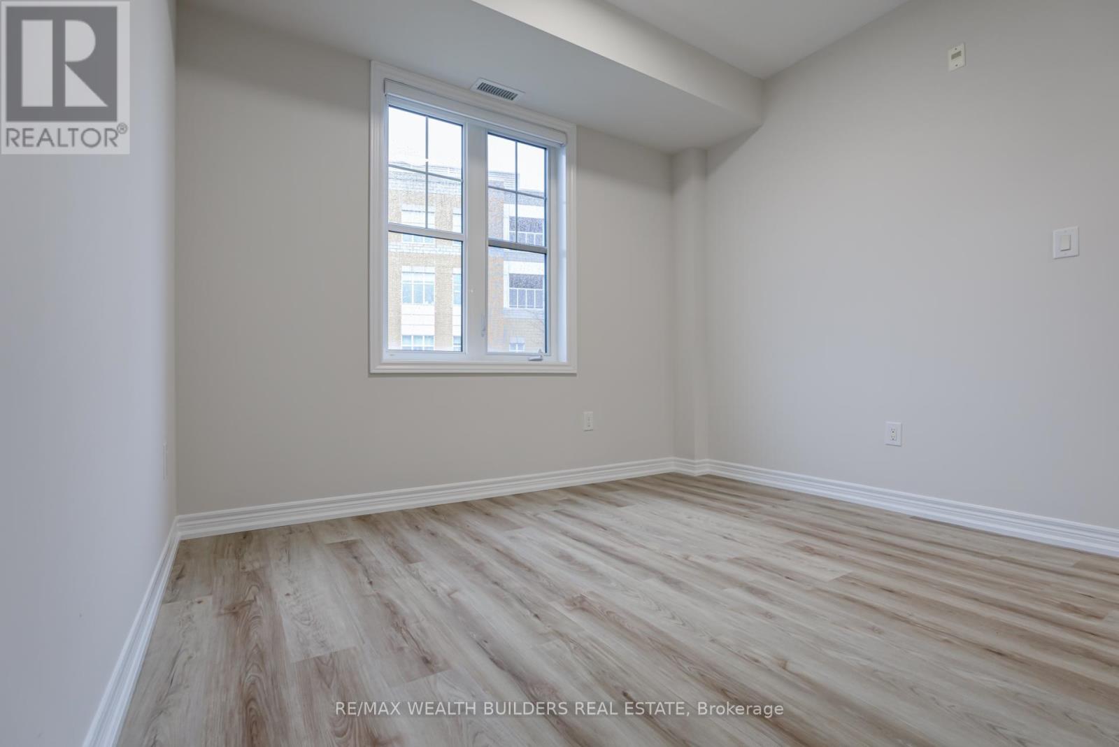 202 - 2333 Sawgrass Drive, Oakville, Ontario  L6H 0L2 - Photo 9 - W12200997