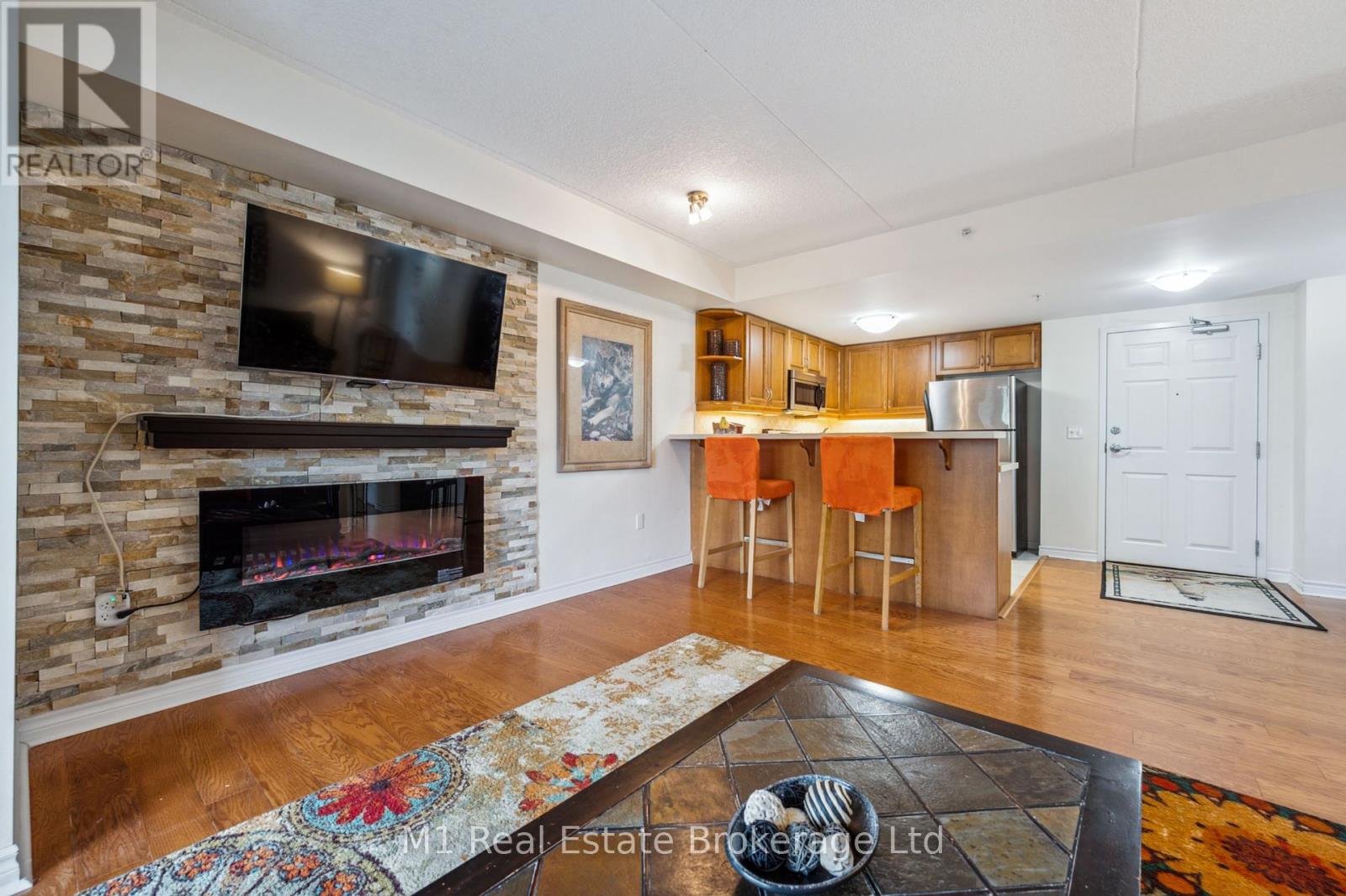 105 - 19 Waterford Drive, Guelph, Ontario  N1L 0G8 - Photo 2 - X12168033