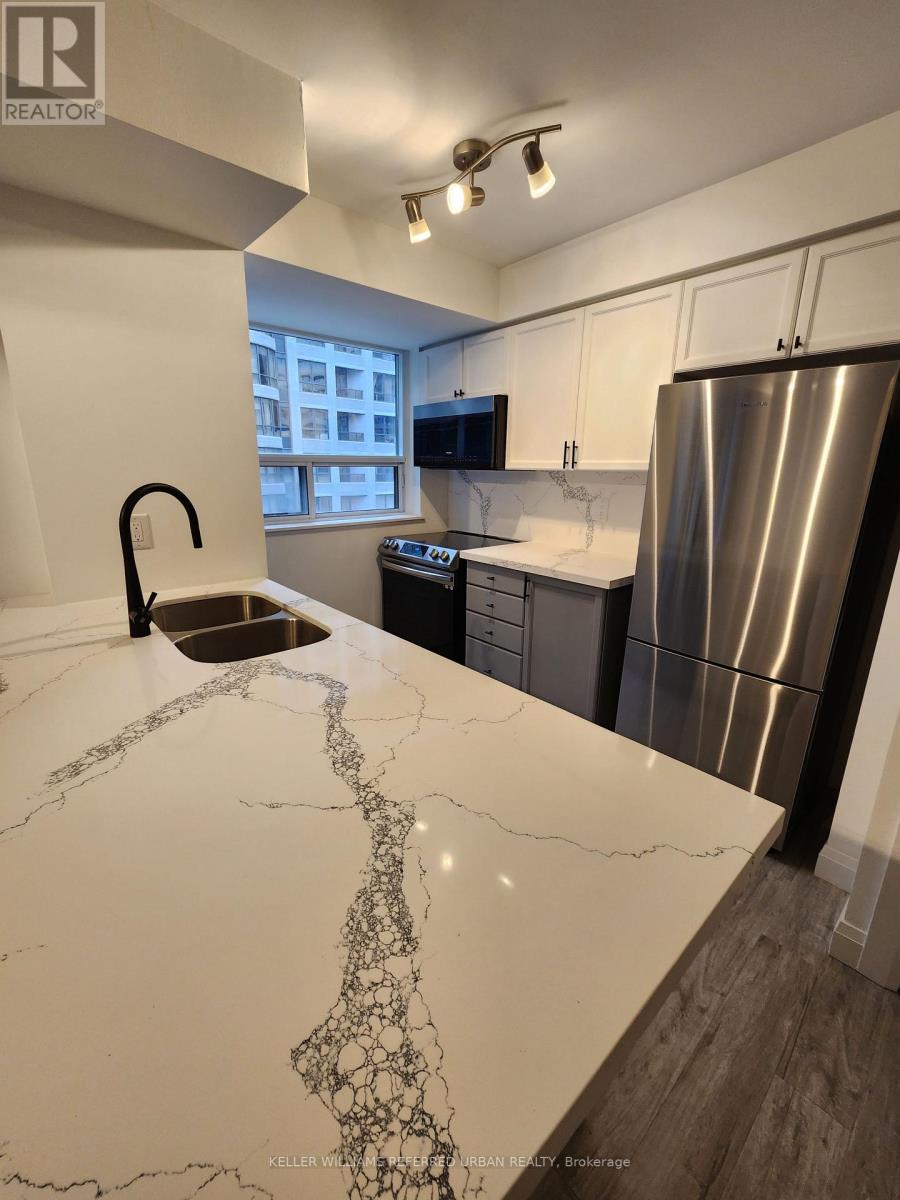 1407 - 30 Hayden Street, Toronto, Ontario  M4Y 3B8 - Photo 1 - C12201191
