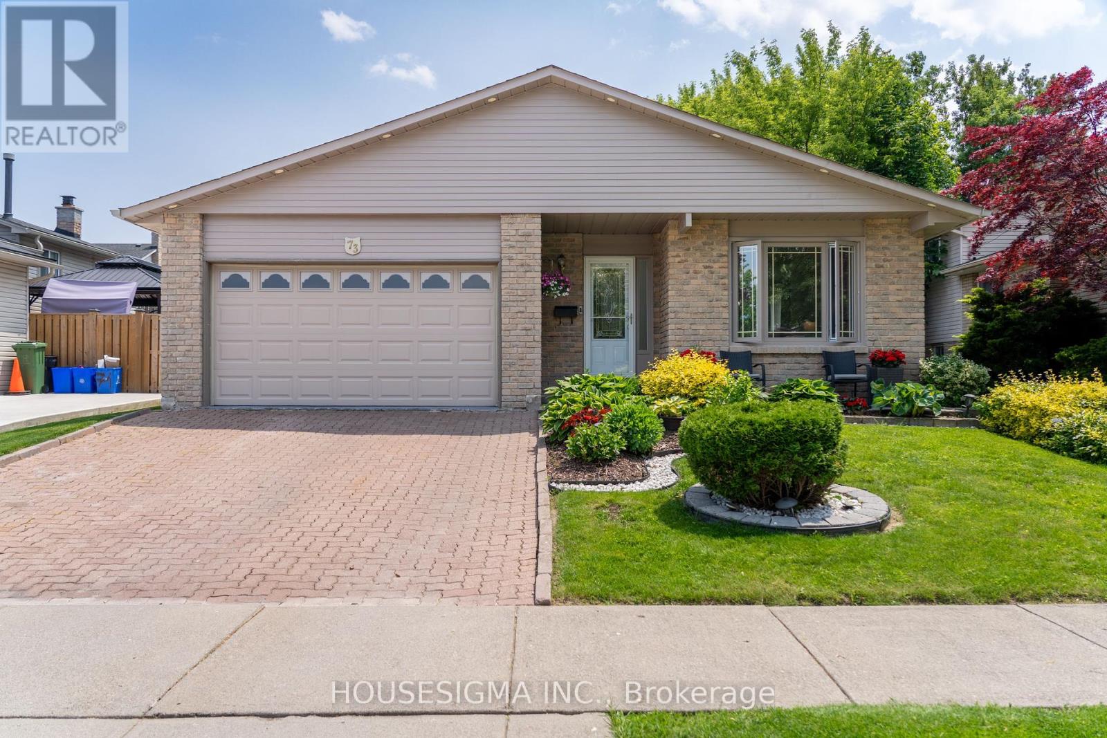 73 Athenia Drive, Hamilton (Stoney Creek Mountain), Ontario  L8J 1S4 - Photo 1 - X12201231
