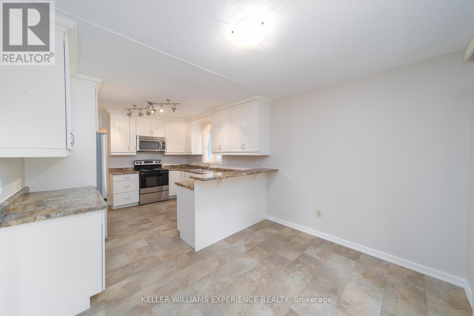 14 Ashdale Court, Barrie, Ontario  L4M 5B5 - Photo 8 - S12201483