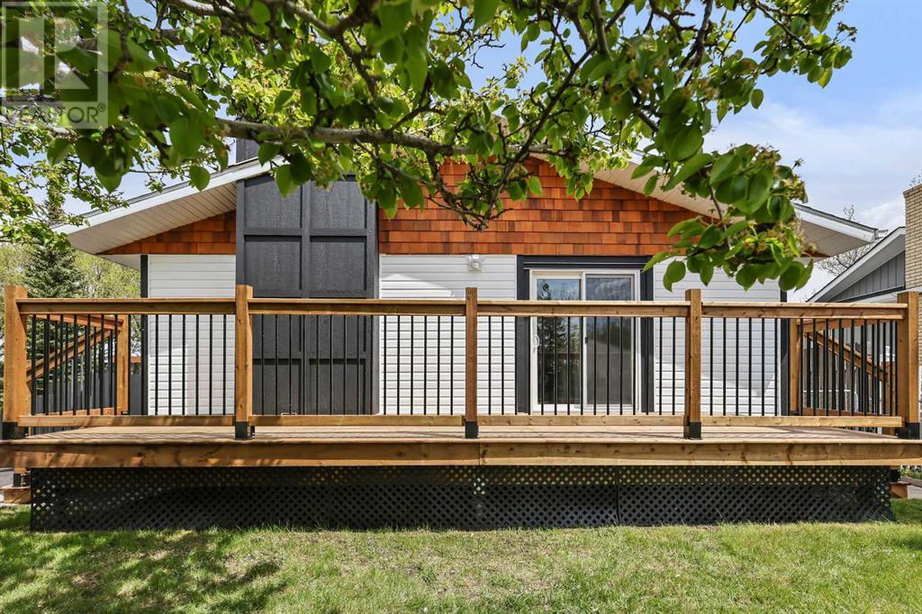 Property at 8704 6 Street SE image 3