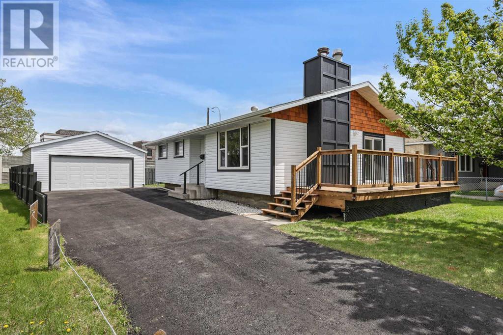 Property at 8704 6 Street SE image 2