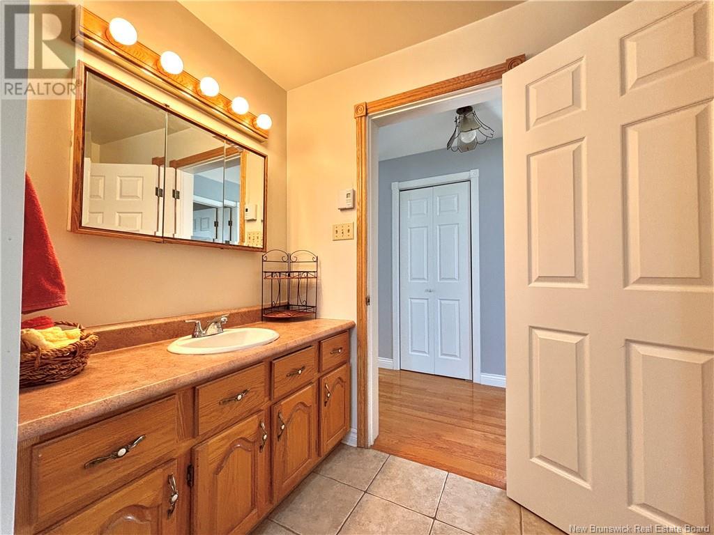 784 St Pierre, Beresford, New Brunswick  E8K 1S1 - Photo 17 - NB118441