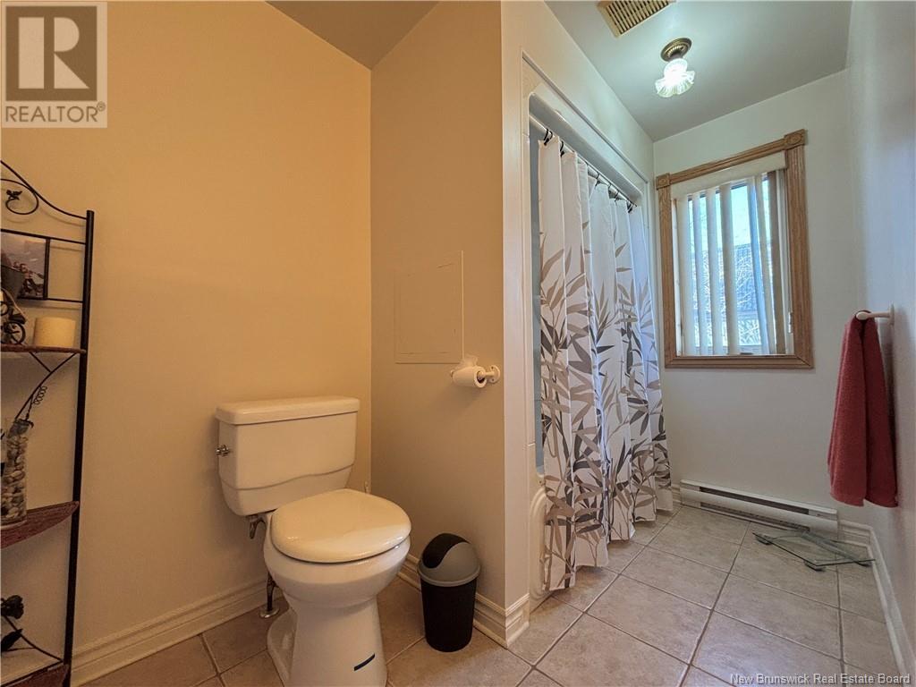 784 St Pierre, Beresford, New Brunswick  E8K 1S1 - Photo 18 - NB118441