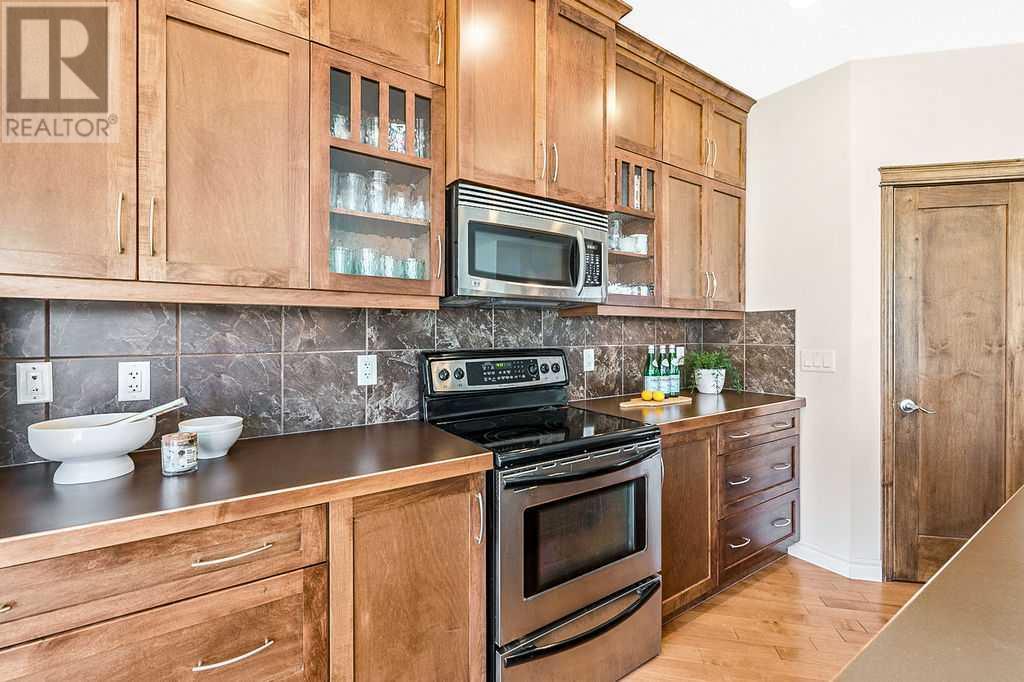 419 Cimarron Boulevard, Okotoks, Alberta  T1S 0A9 - Photo 6 - A2212816