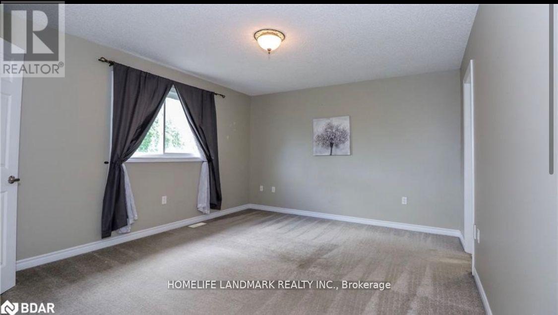 61 Summerset Drive, Barrie, Ontario  L4N 0B2 - Photo 6 - S12201985