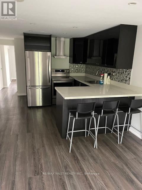 2 - 13 Sorauren Avenue, Toronto, Ontario  M6R 2C6 - Photo 2 - W12201900