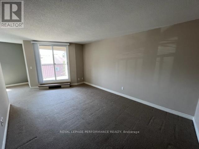 201 - 8 Pearl Street, Smiths Falls, Ontario  K7A 5B5 - Photo 2 - X12202266
