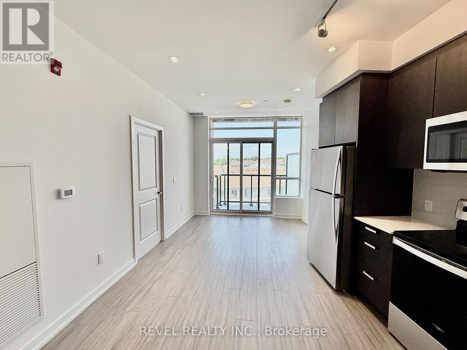 523 - 1010 Dundas Street E, Whitby (Blue Grass Meadows), Ontario  L1N 0L6 - Photo 4 - E12202350