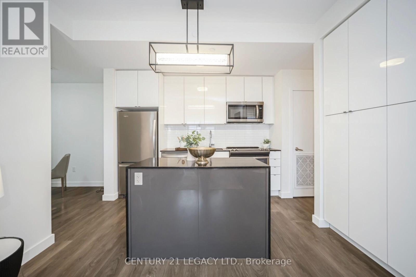 317 - 210 Sabina Drive, Oakville, Ontario  L6H 0W6 - Photo 11 - W12202655
