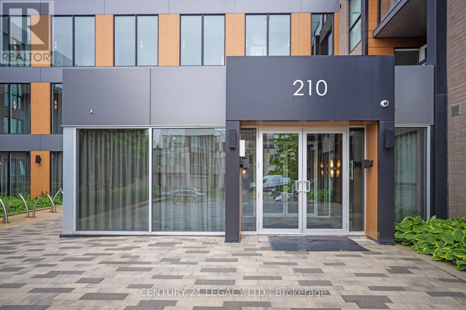 317 - 210 Sabina Drive, Oakville, Ontario  L6H 0W6 - Photo 2 - W12202655