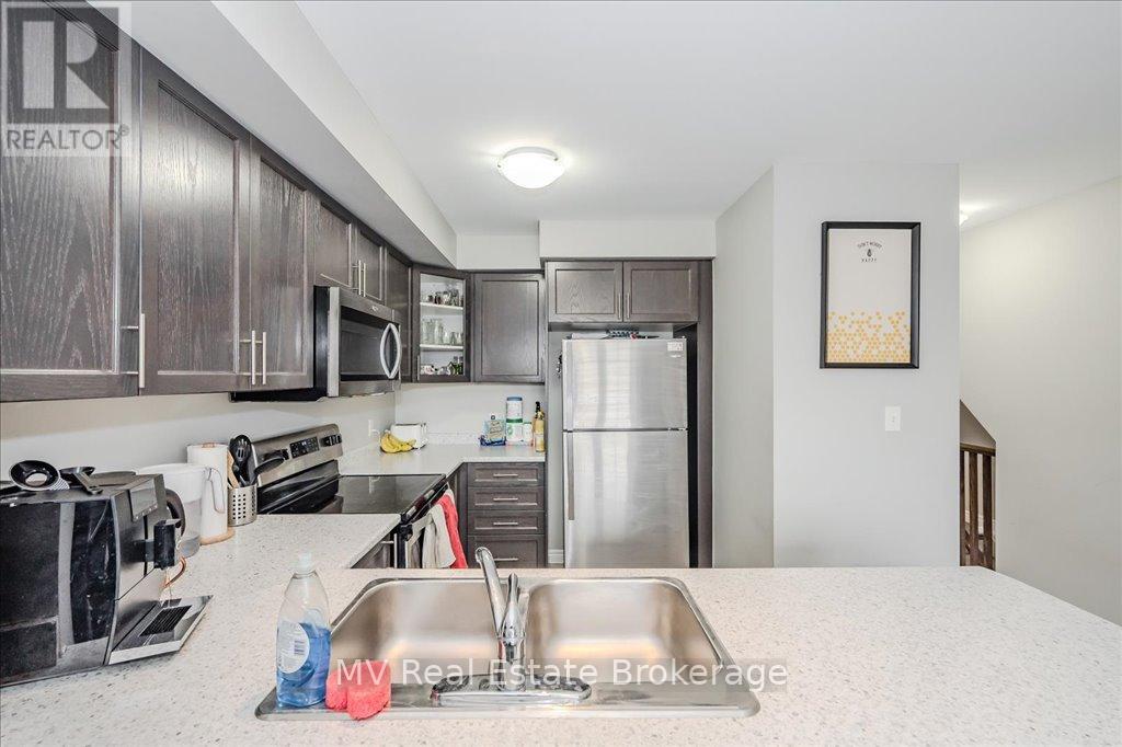 2b - 85 Mullin Drive, Guelph, Ontario N1E 0R4 - Photo 5 - X12176013