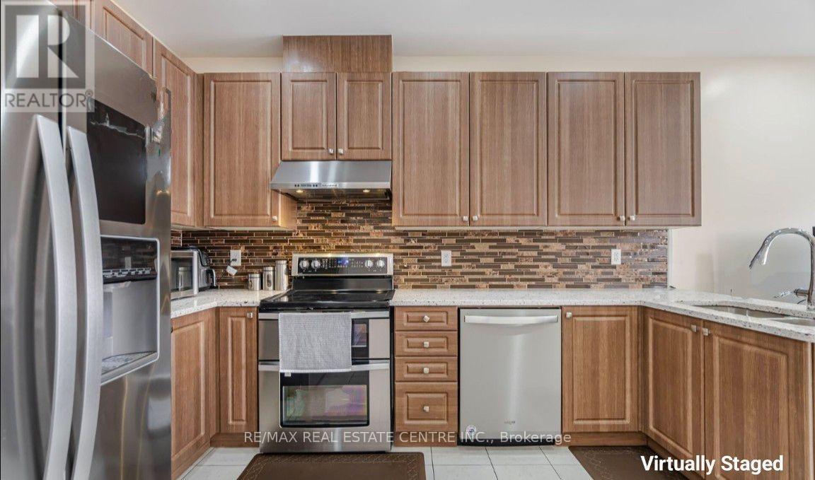 14 Gulfbrook Circle, Brampton (Sandringham-Wellington), Ontario  L6Z 0G4 - Photo 5 - W12198712
