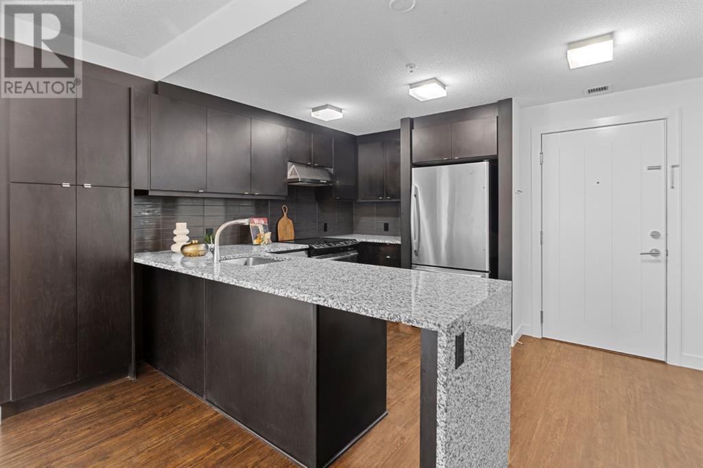 104, 25 Aspenmont Heights Sw, Calgary, Alberta  T3H 0E4 - Photo 1 - A2210888