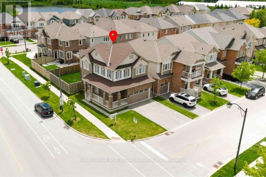 974 Penson Crescent, Milton, Ontario  L9T 8Z7 - Photo 6 - W12203253