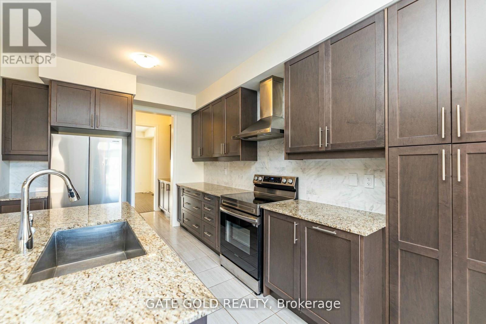 861 Rexton Drive, Oshawa, Ontario  L1H 8L7 - Photo 6 - E12203475